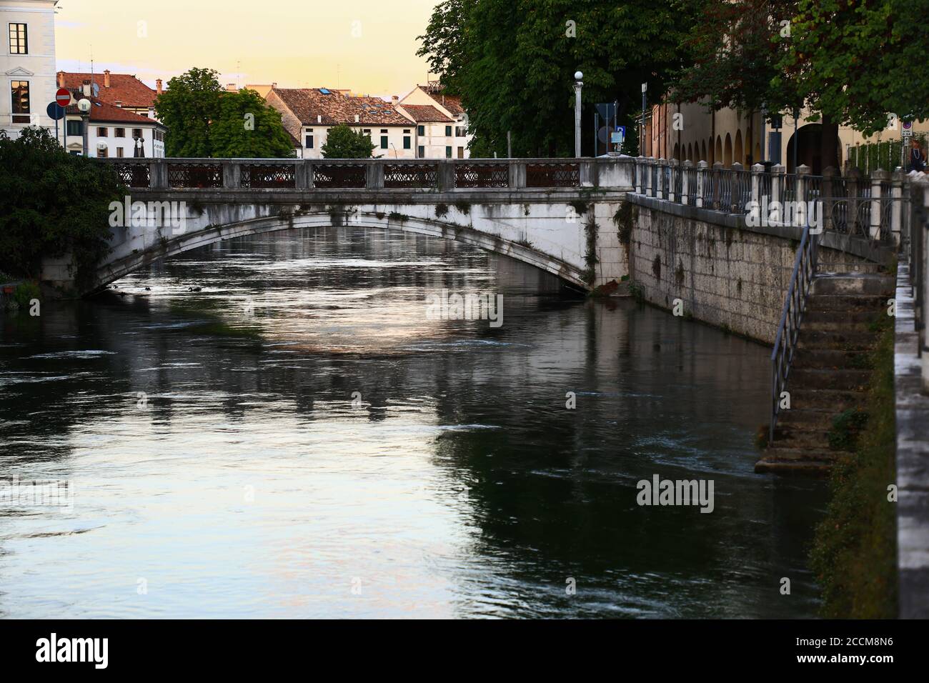 Treviso historic centre and view on water canal with bridge at sunset - street and urban photography Stock Photo