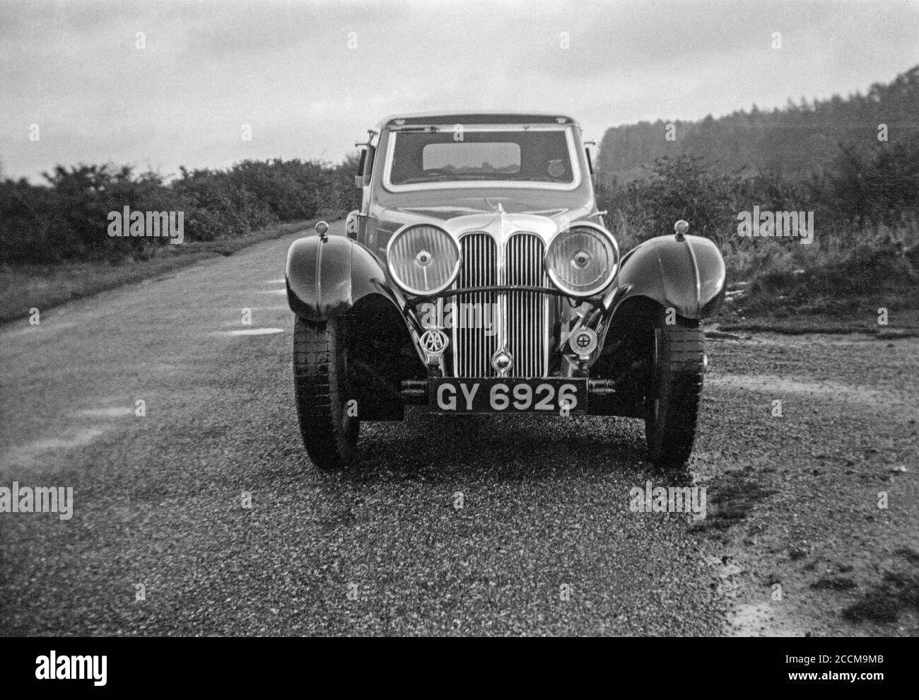 Vintage 1930s black and white photograph of a British Jaguar SS I Coupe Sports car. Registration number GY 6926. Stock Photo