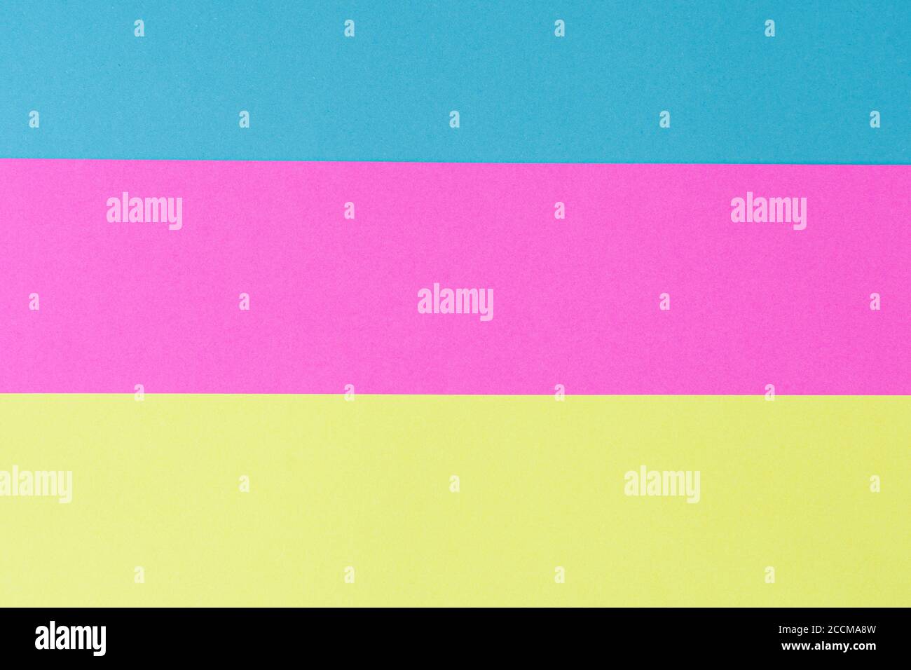 blue pink yellow strips of paper as one. background for labels Stock Photo