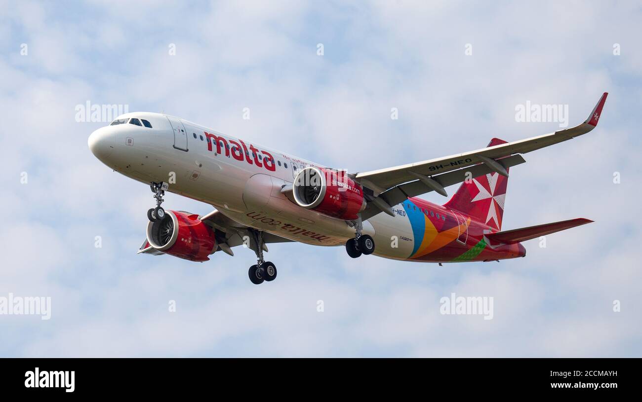Air Malta Airbus A320 Landing At Heathrow Airport High Resolution Stock