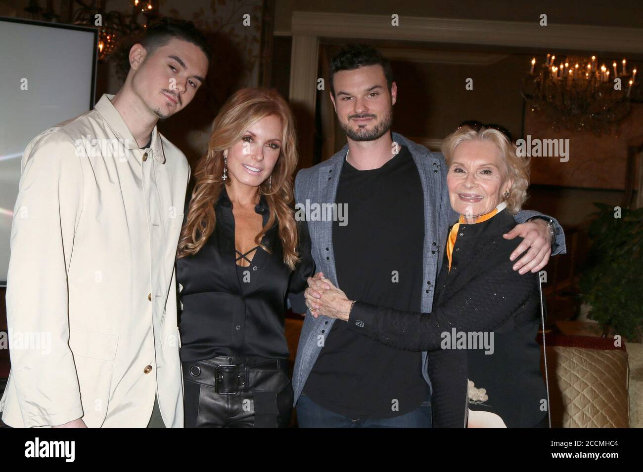 LOS ANGELES - FEB 2:  Landon Recht, Tracey Bregman, Austin Recht, Suzanne Lloyd at the Tracey Bregman 35th Anniversary on the Young and the Restless at CBS TV City on February 2, 2018 in Los Angeles, CA Stock Photo