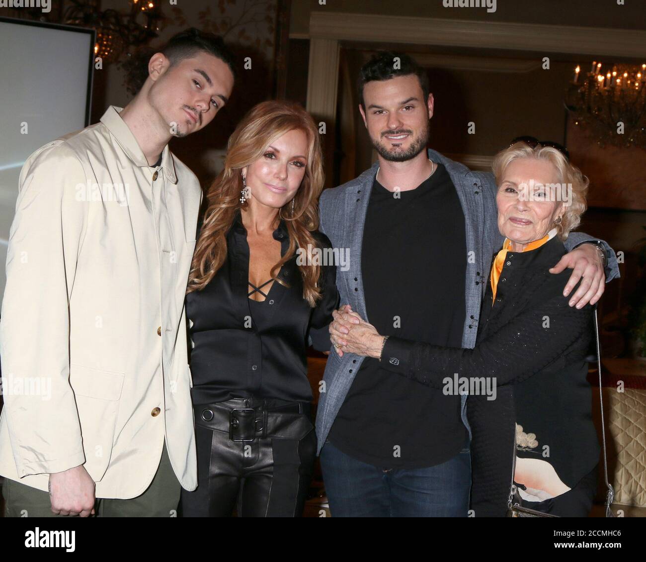 LOS ANGELES - FEB 2:  Landon Recht, Tracey Bregman, Austin Recht, Suzanne Lloyd at the Tracey Bregman 35th Anniversary on the Young and the Restless at CBS TV City on February 2, 2018 in Los Angeles, CA Stock Photo