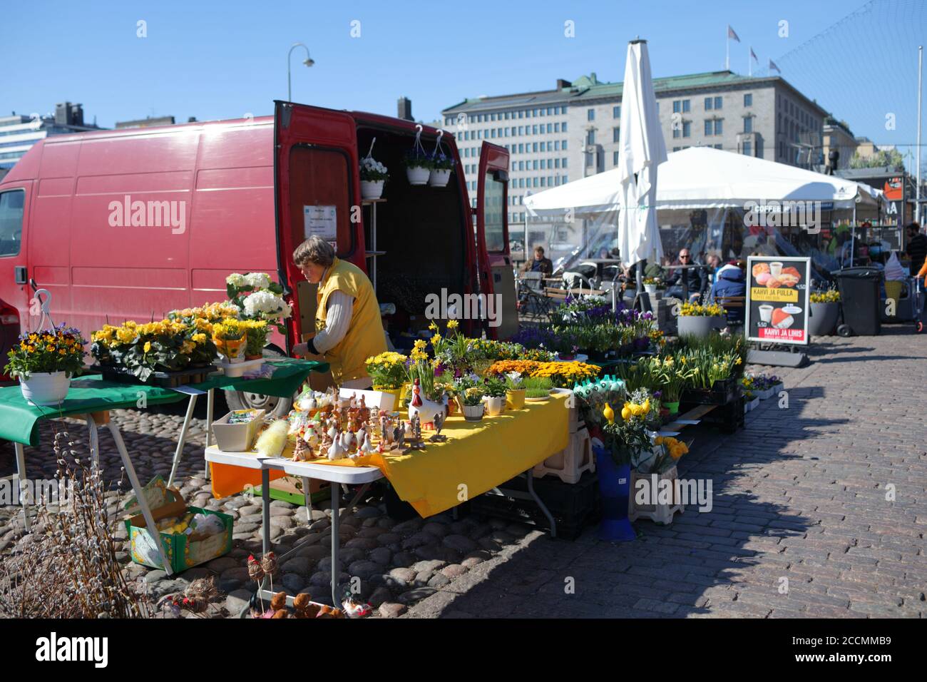Flower vendor on the Market square of Helsinki, Finland in a sunny springtime day Stock Photo