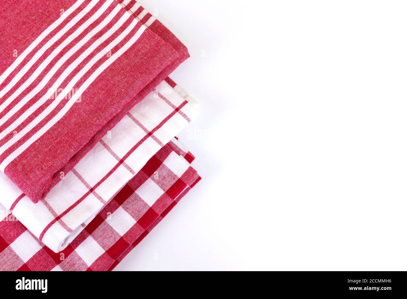 Red checkered gingham kitchen towels top view on white with copy space Stock Photo