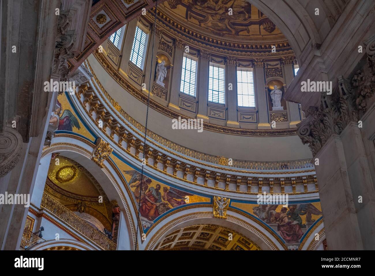Looking up into the Dome and painted ceilings of St Pauls Cathedral in central London Stock Photo