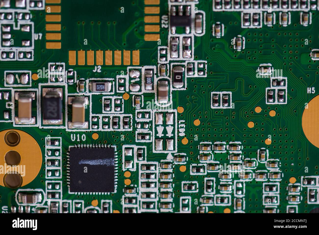 Closeup of an electronic circuit board populated with resistors