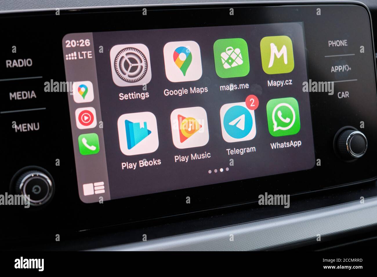 Apple CarPlay screen in the car dashboard main menu. Entertainment in