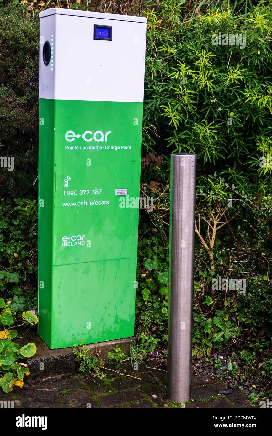 Clifden, Ireland - January 4, 2020: Reserved parking space for electric vehicles with charging point in the town of Clifden, in the region of Connemar Stock Photo