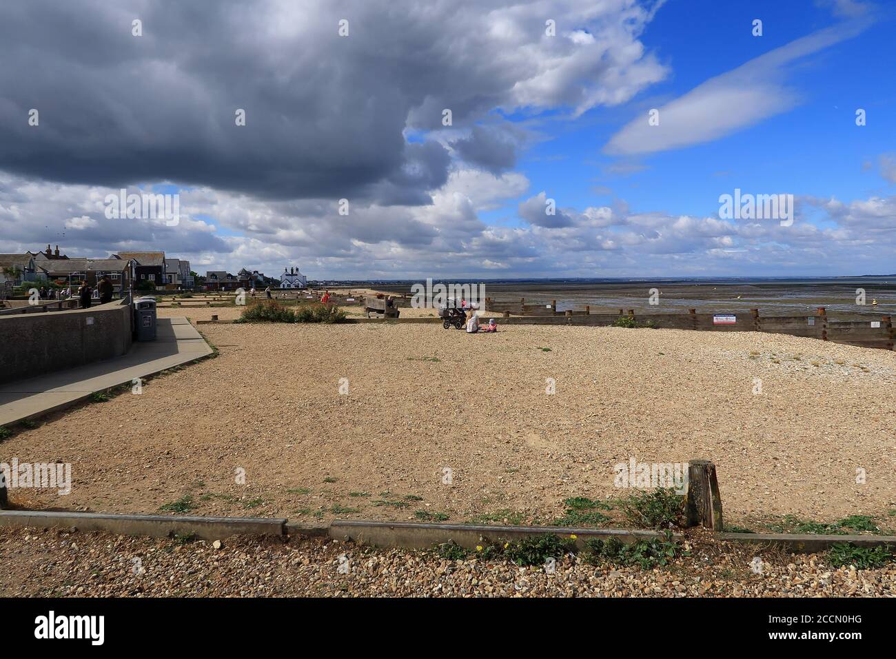 A view of the Dark clouds and blue skies over Whitstable Stock Photo