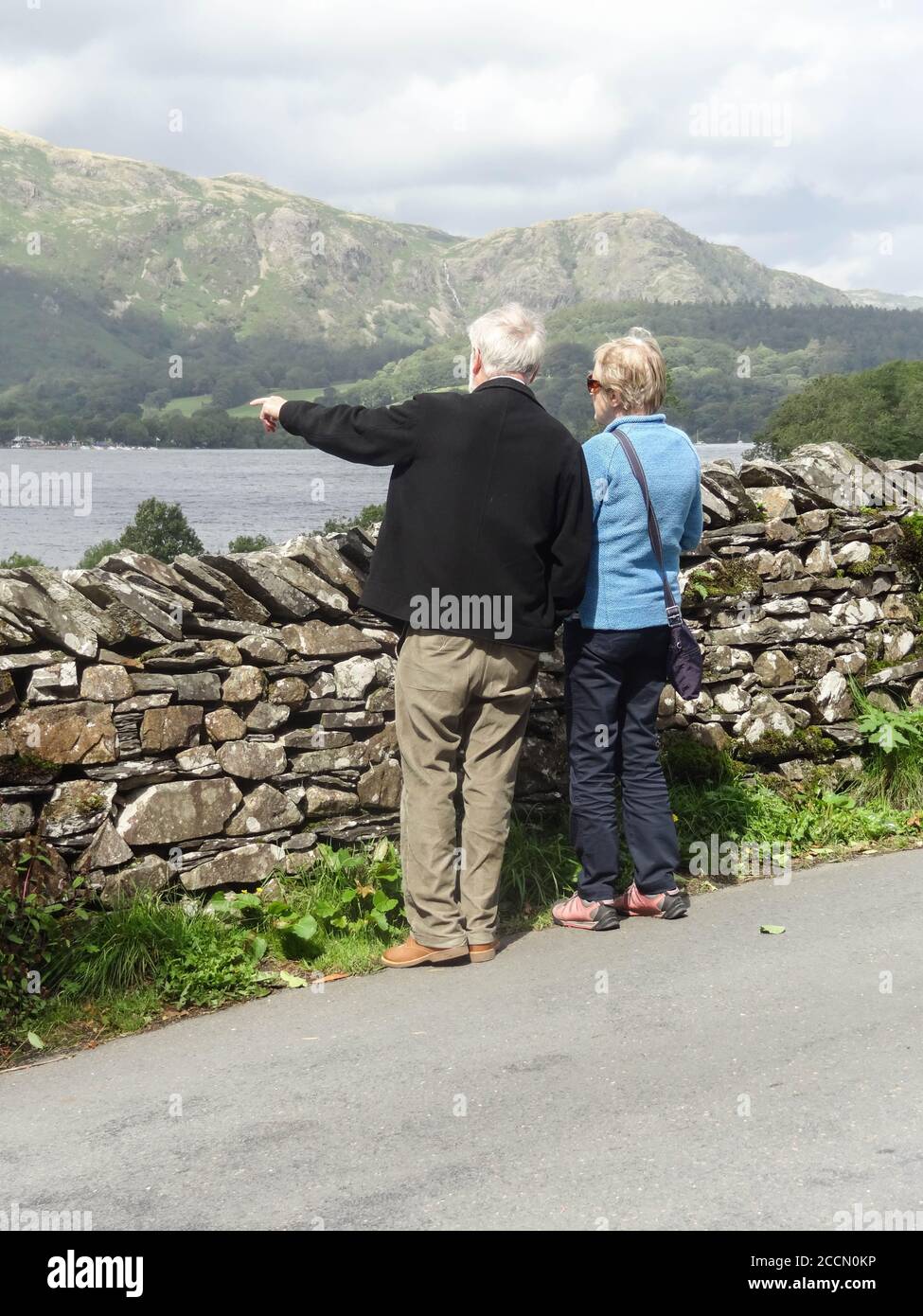 Husband and wife looking at Lake Coniston and the Old Man of Coniston