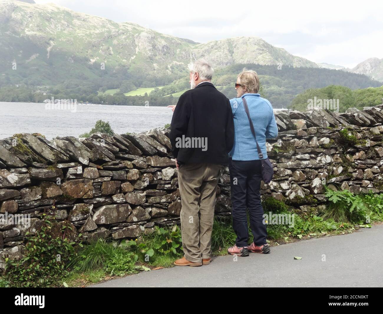 Husband and wife looking at Lake Coniston and the Old Man of Coniston
