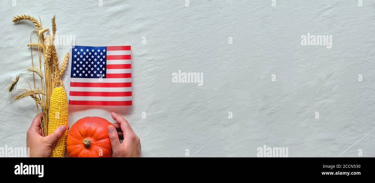 Happy Thanksgiving Day Usa American Flag On White Textile Hand Holding Corn Cob And Wheat Ears Orange Pumpkin Harvest Autumn Holiday Decor Banner Stock Photo Alamy