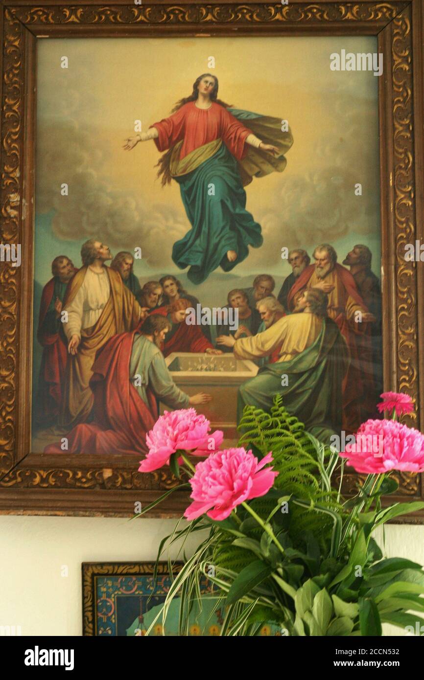 Painting on a wall depicting the Assumption of Virgin Mary into Heaven ...