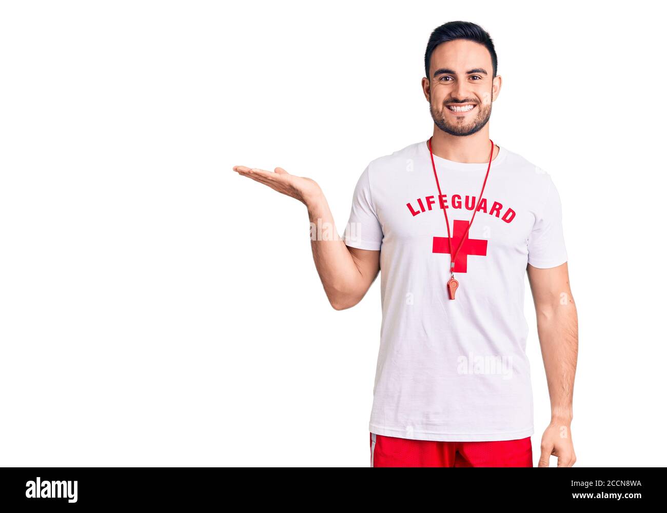Young handsome man wearing lifeguard uniform smiling cheerful