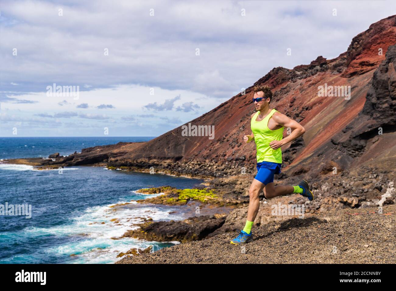 Man Trail Running In The Mountain Hills Nature Landscape Ultra Runner Competing On Cross