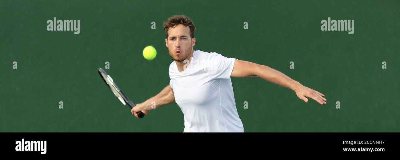 Tennis player man banner hitting ball with racket on green horizontal copy space background. Sports athlete training forehand grip technique on Stock Photo