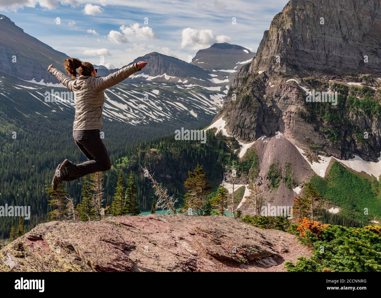 Woman jumps lake hi-res stock photography and images - Alamy