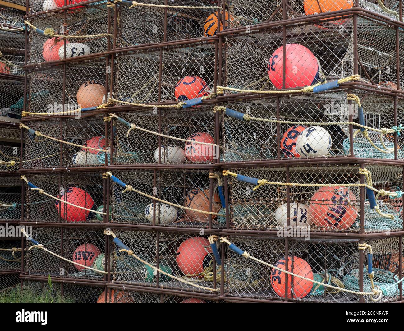 King crab fishing pots being stored at the dock in Dutch Harbor in the community of Unalaska, Alaska. Stock Photo