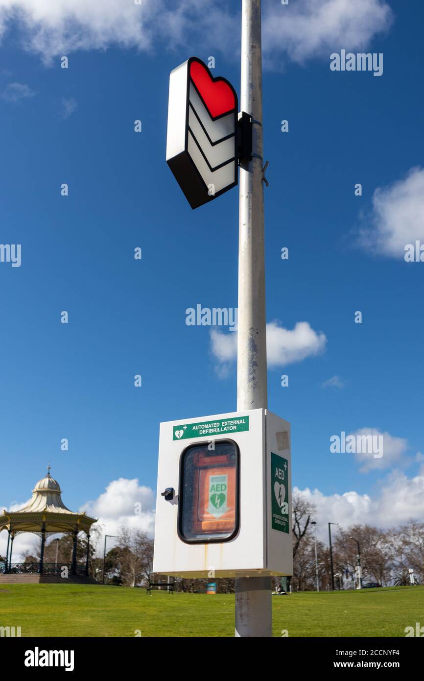 AED Automated external defibrillator placed at a public park. Heart and