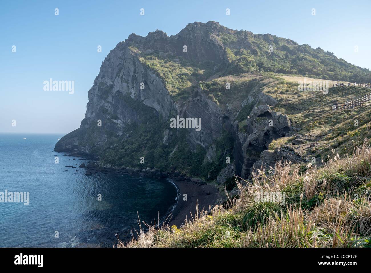 Beautiful scenery of Seongsan Ilchulbong inactive volcano with the sea in Juje island, South Korea. Stock Photo