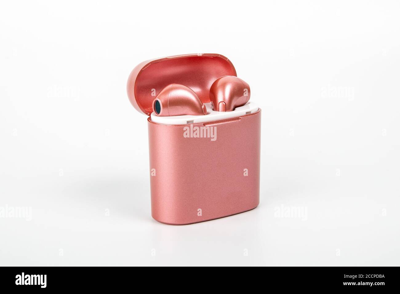 Riga, Latvia - August 19 ,2020: SKINNYDIP earbuds. Pink wireless bluetooth  headphones and box on white background Stock Photo - Alamy