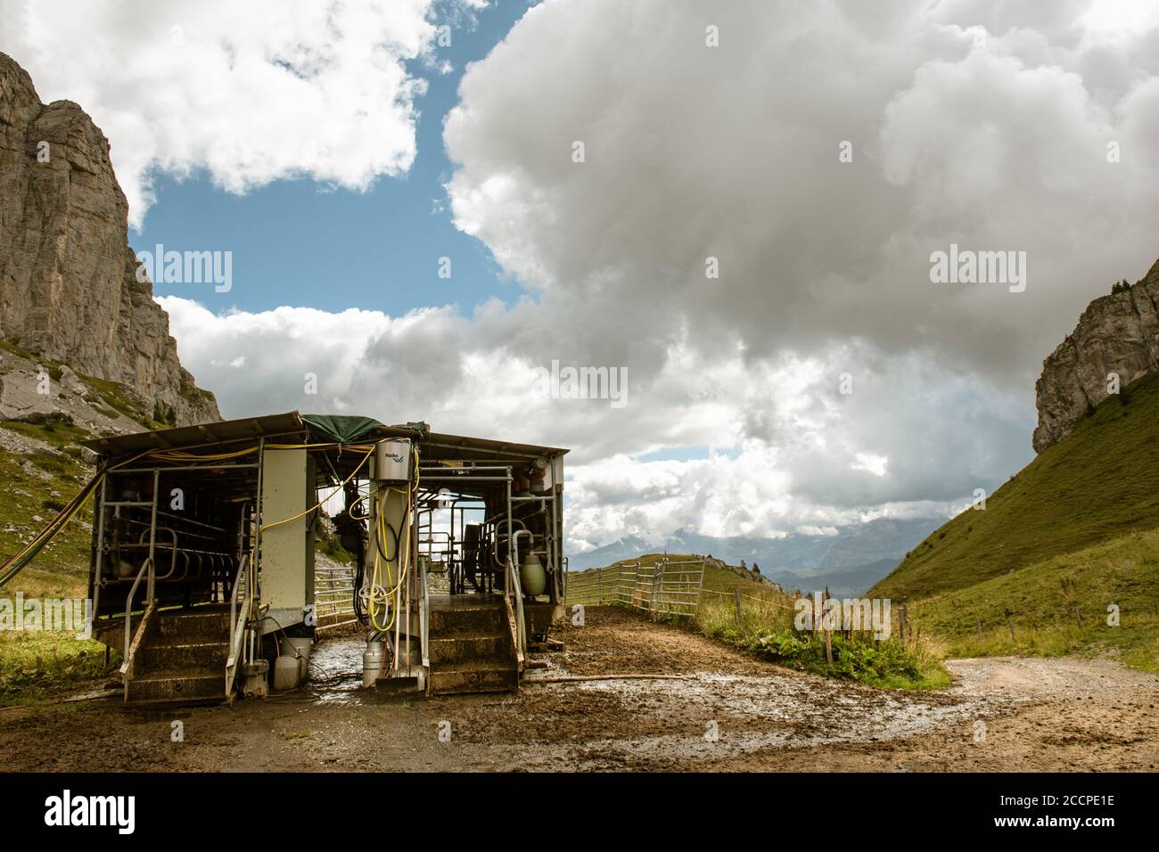 A cow milking unit in the Chaux-de-Mont valley, Switzerland Stock Photo