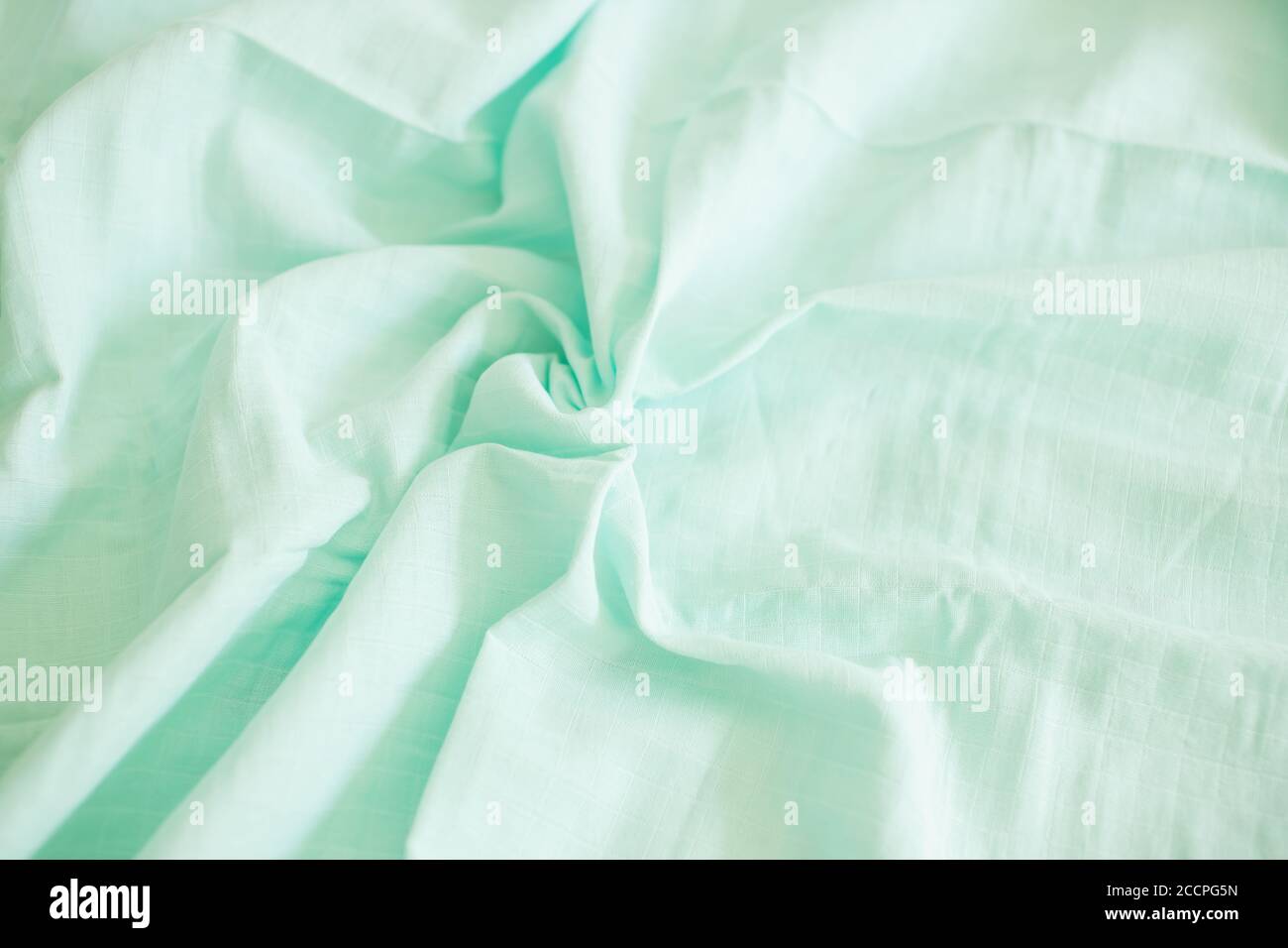 Beautiful mint muslin fabric, top view Stock Photo