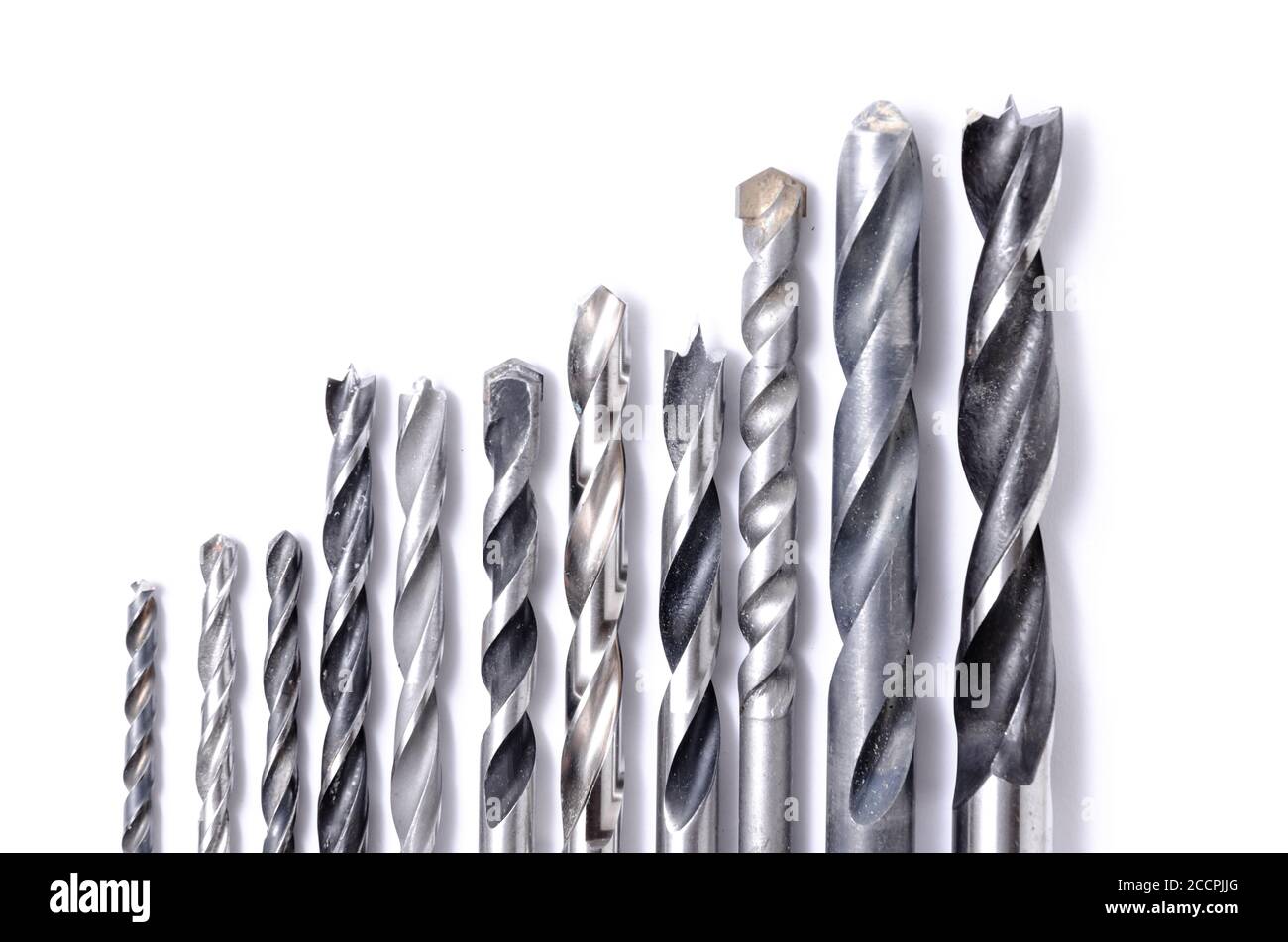 Group of metal wood drill bits, assorted, isolated on white background