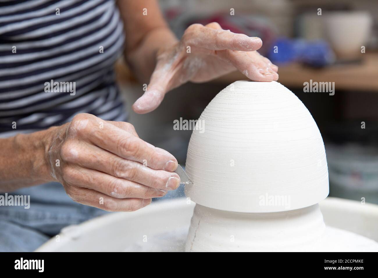 ceramicist at work in her studio Stock Photo