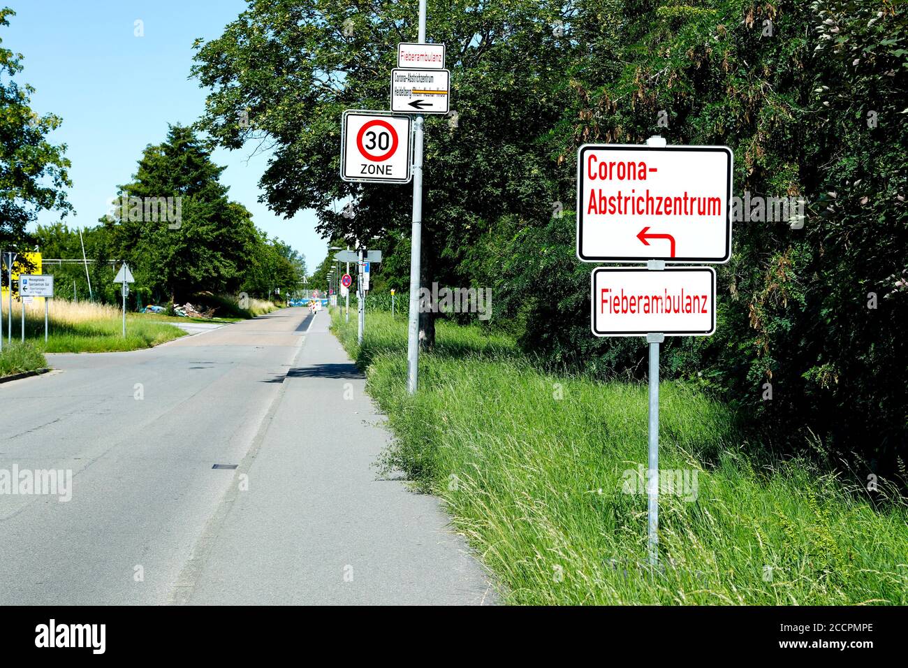 Heidelberg/Bavaria, Germany - June 24, 2020: Corona / Covid19 Drive In sign. Showing the way to the test station at Heidelberg-Kirchheim (Germany). Stock Photo