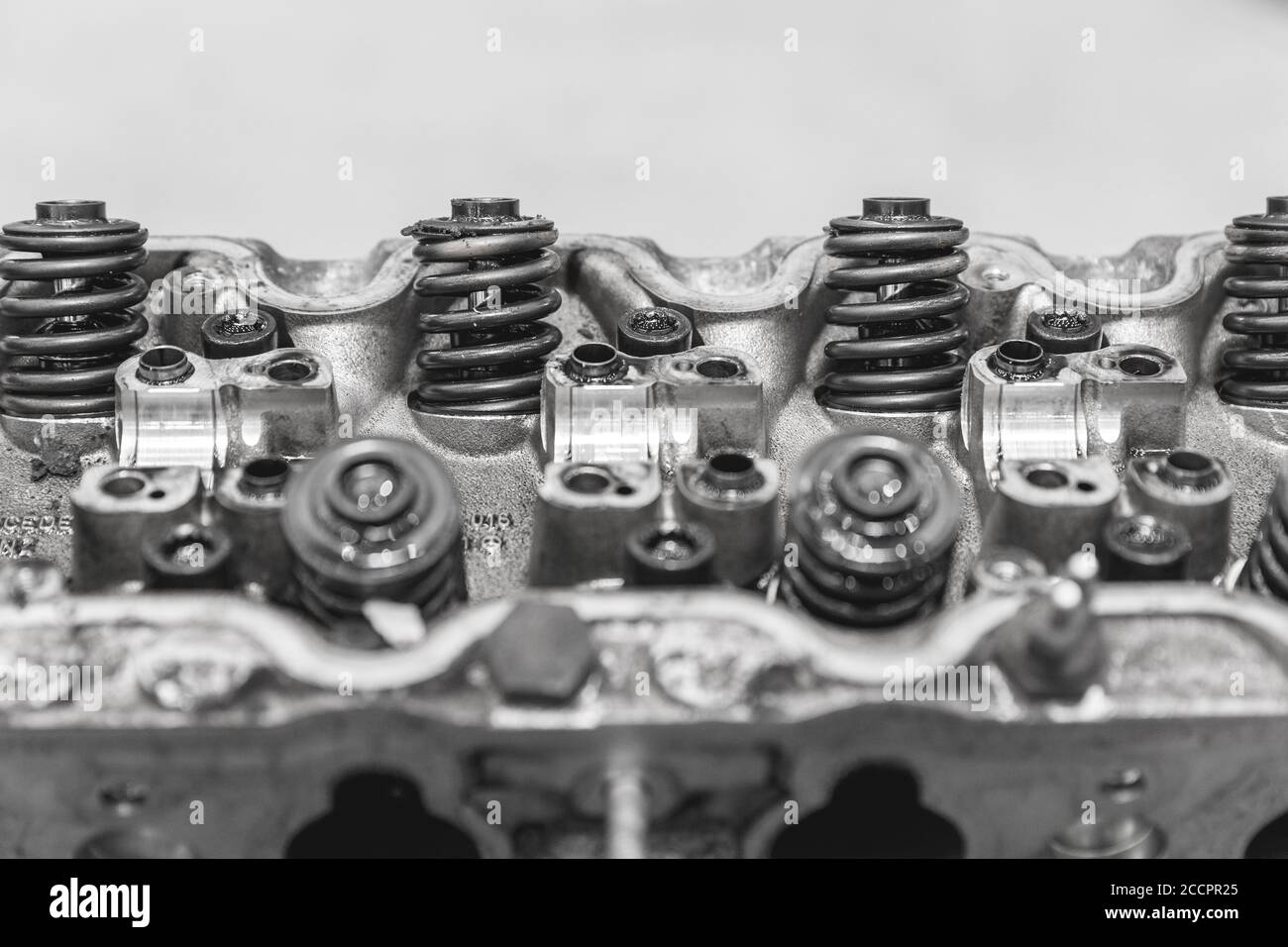 Head of a car engine repairing. Modern cars spare parts, black and