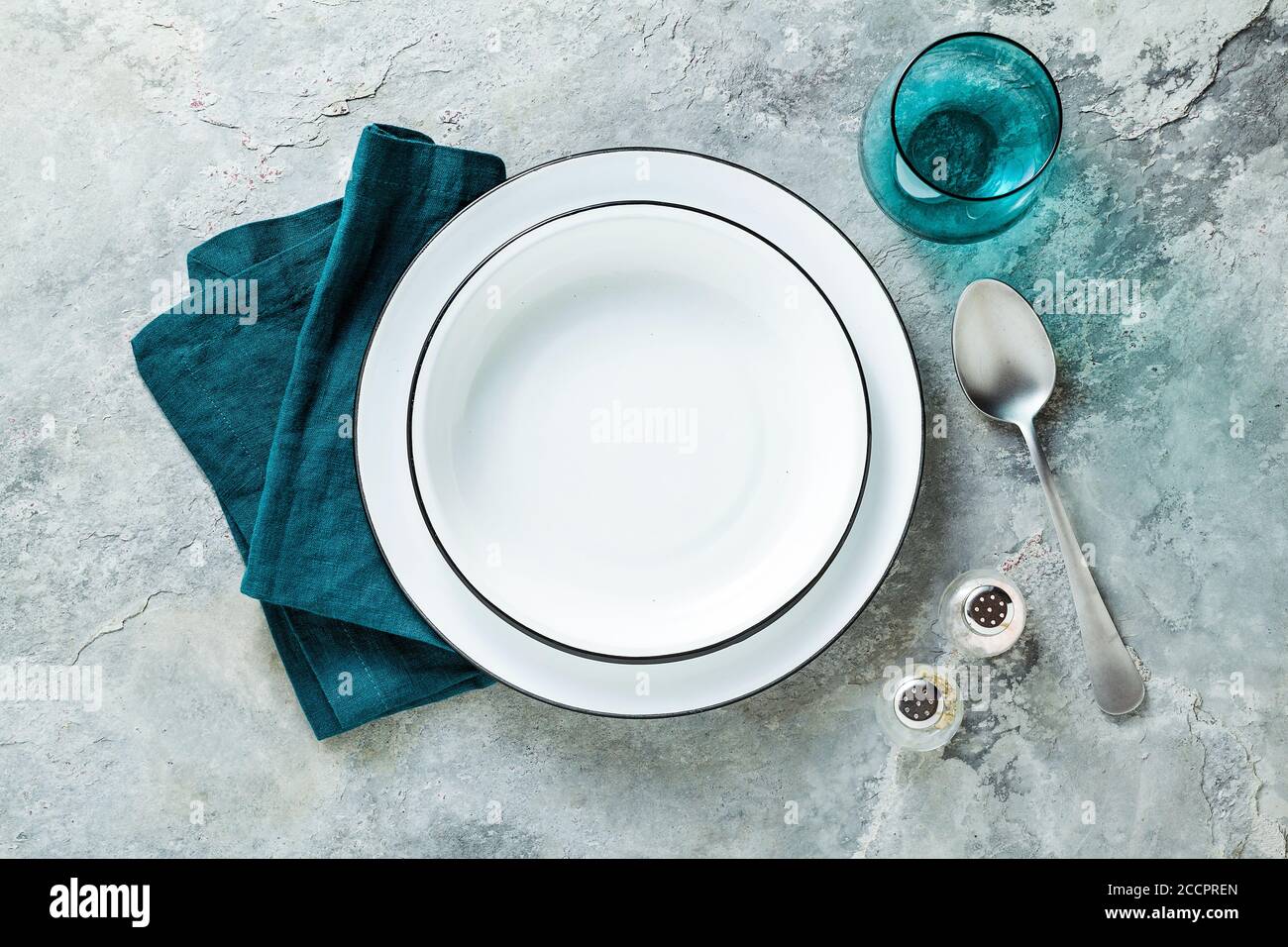 table setting with set of empty plates on stone background Stock Photo