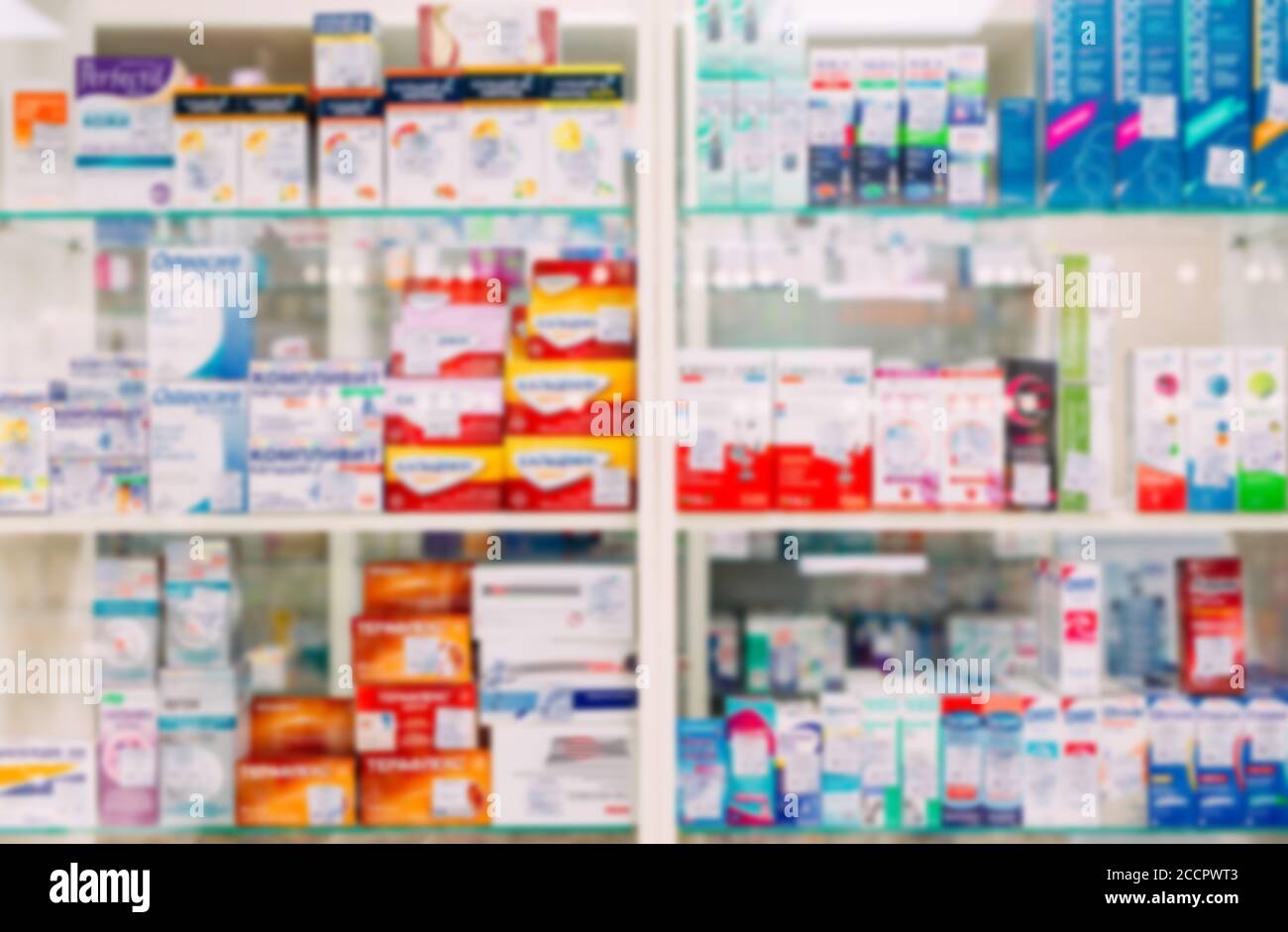 counter store table pharmacy background shelf blurred blur focus drug medical shop drugstore medication blank medicine pharmaceutics. Stock Photo