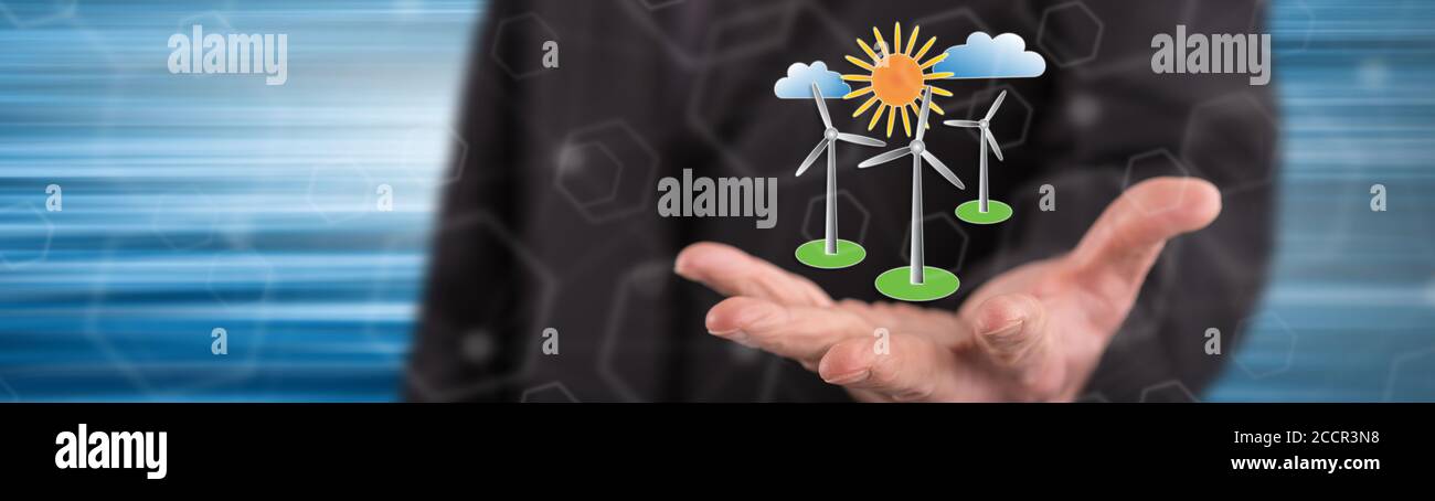 Clean energy concept above the hand of a man in background Stock Photo ...