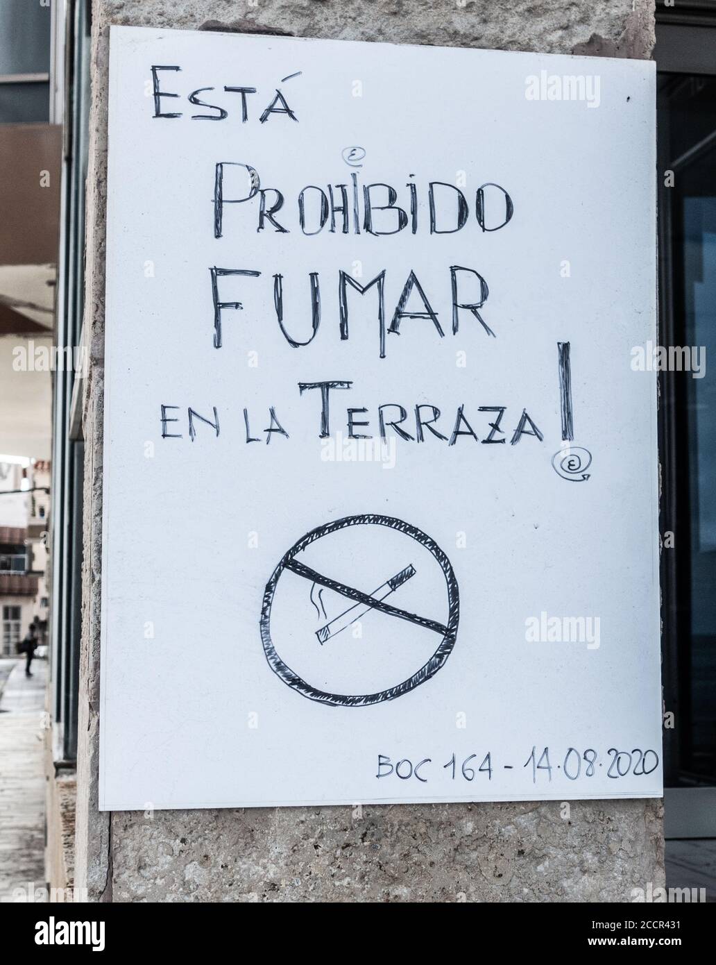 No smoking sign at outside cafe table in Spain. Stock Photo