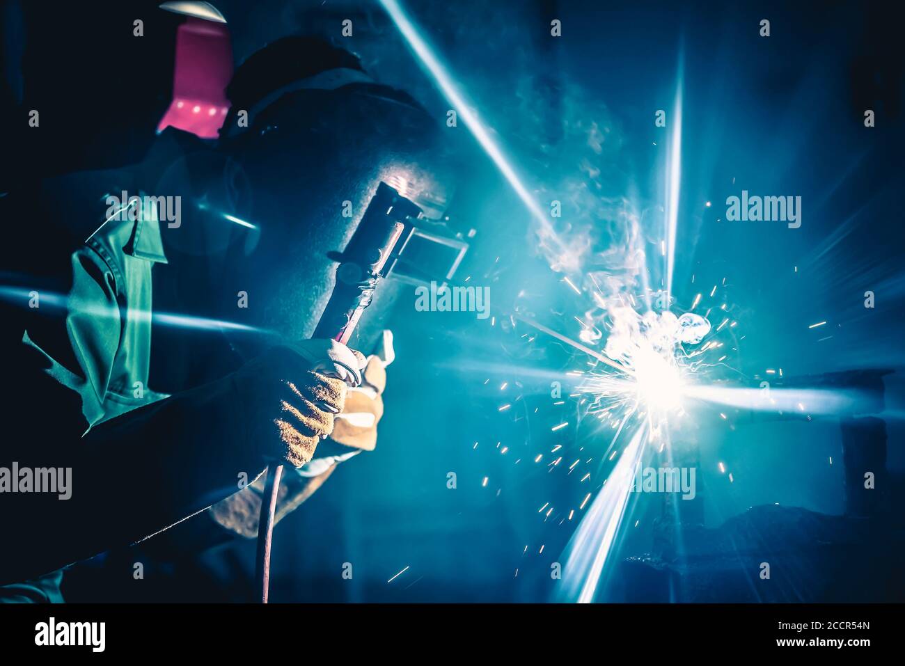 Metal welding steel works using electric arc welding machine Stock