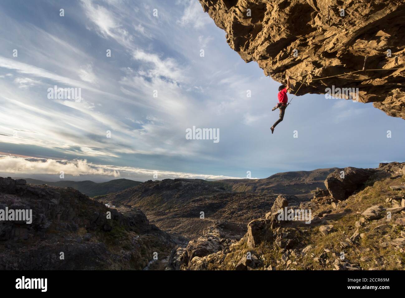 Man Hanging On Cliff High Resolution Stock Photography and Images Alamy