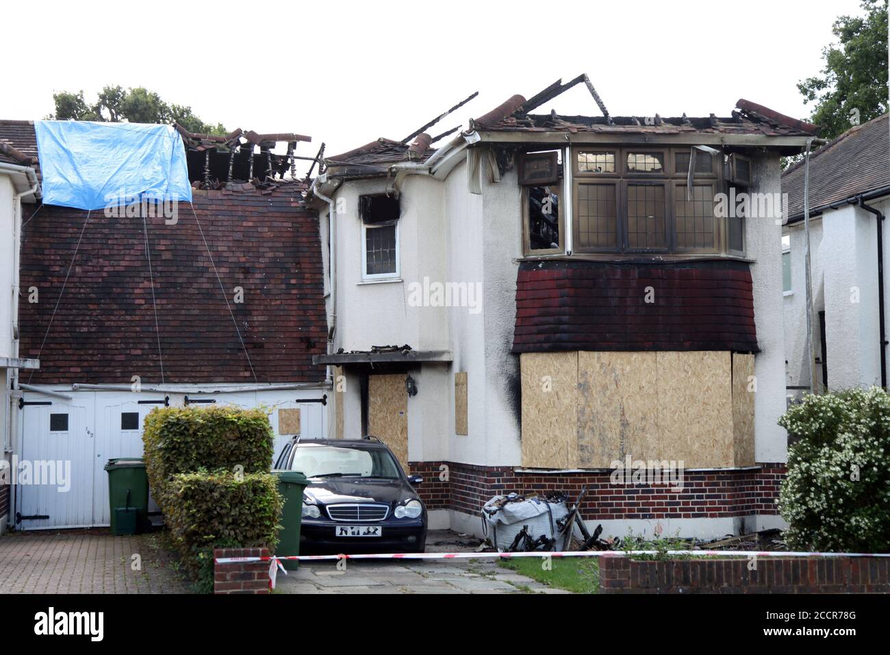 Burnt out fire damaged shell of semi detached house on Craddocks Avenue, House fire occurred 14 August 2020, Ashtead, Surrey, England, UK Stock Photo