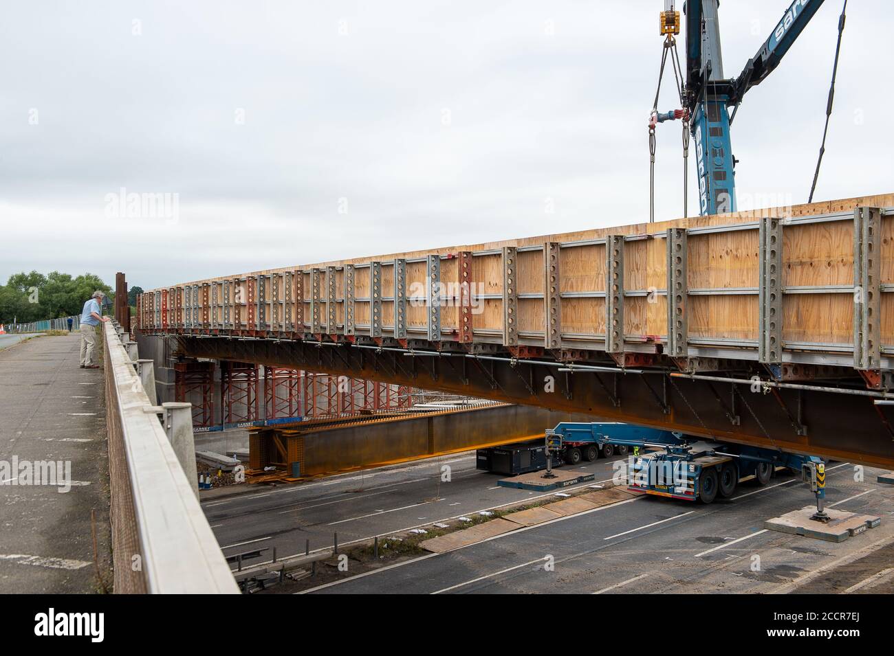 Taplow, Berkshire, UK. 15th August, 2020. The M4 was closed again this weekend between junctions 6 (Slough/Windsor) and Junction 8/9 (Maidenhead) for the installation of a new bridge  across the M4 at Lake End Road, Taplow. The hard shoulder between the M4 Junctions 3 and 12 will be converted into a traffic lane, however, the project remains controversial following the number of deaths on other UK Smart Motorways. Credit: Maureen McLean/Alamy Stock Photo