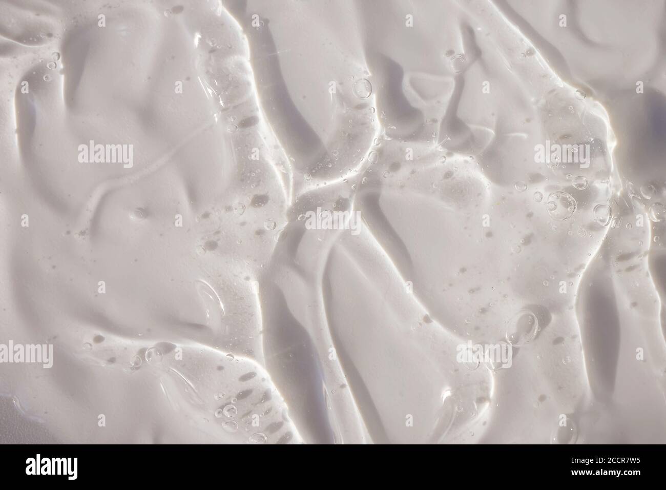 Transparent gel with bubbles texture. Skincare product, welness background Stock Photo