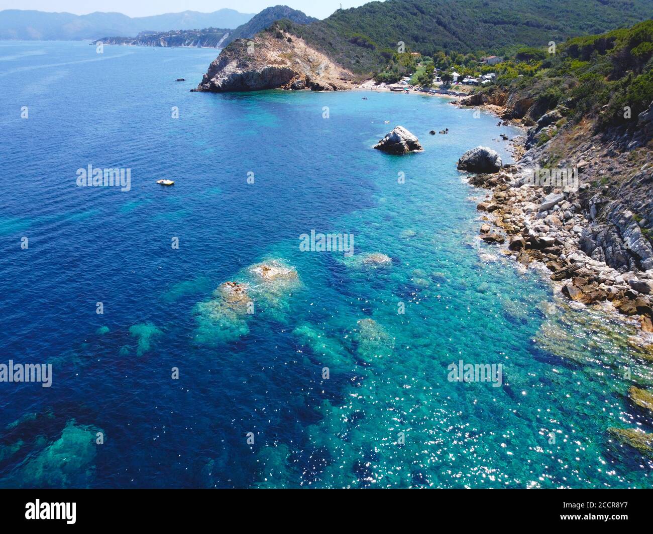 Beautiful crystal clear beach of Sansone, in the italian coast of Tuscany, seen from the drone Stock Photo