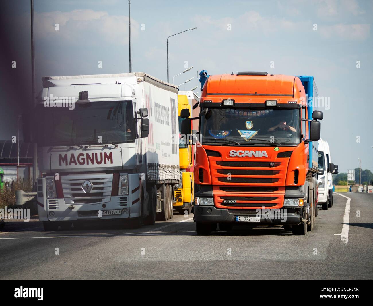 Renault Magnum and Scania trucks on the highway near Kiev Stock Photo
