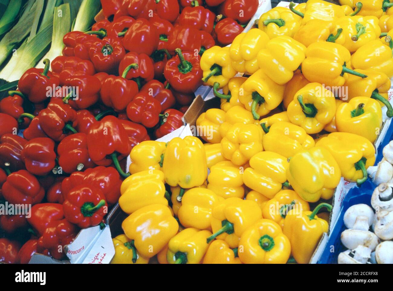 PEPPER red and yellow display at counter in grocery shop Stock Photo