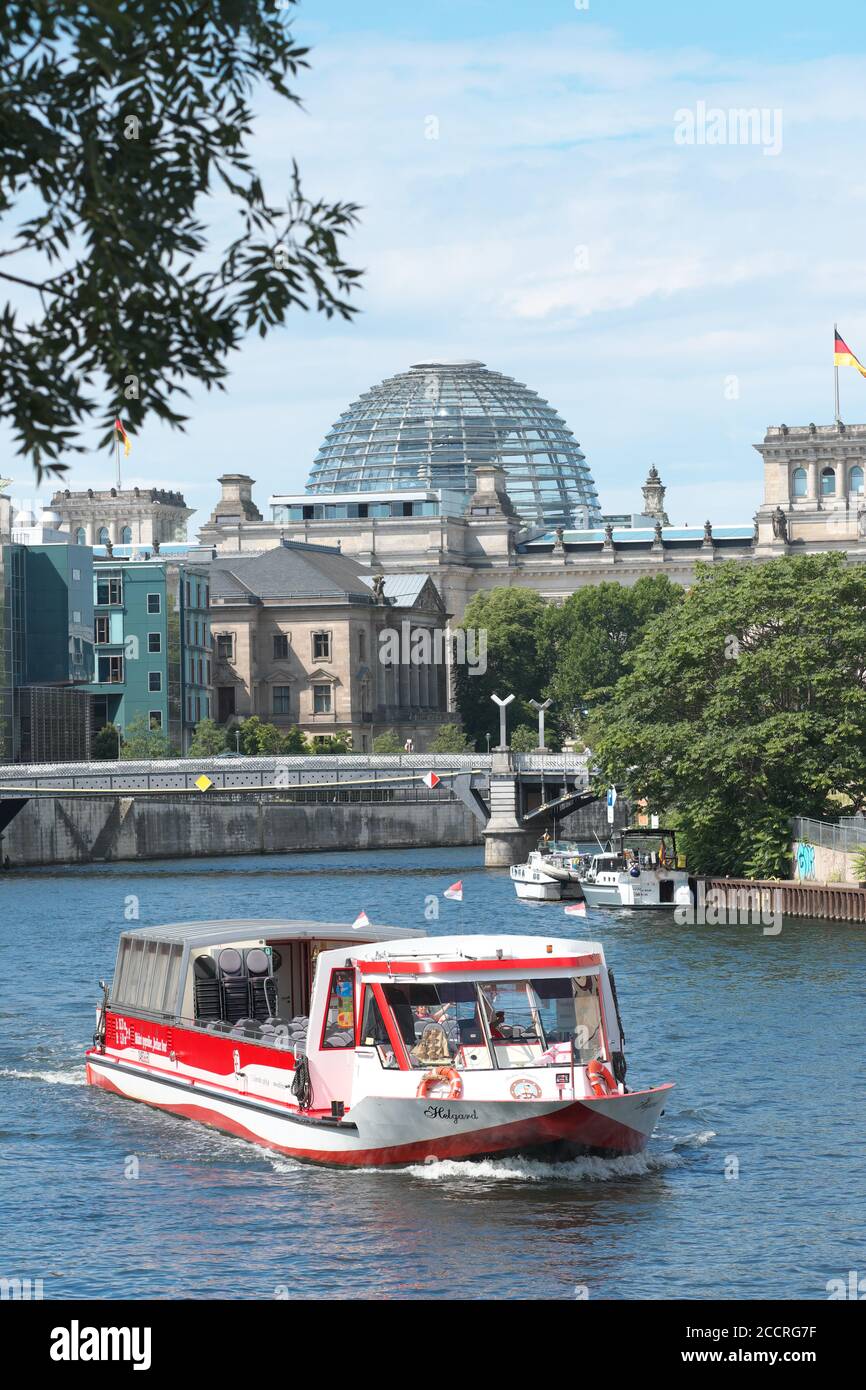 Berlin Germany sightseeing tourist boats on the River Spree with the ...