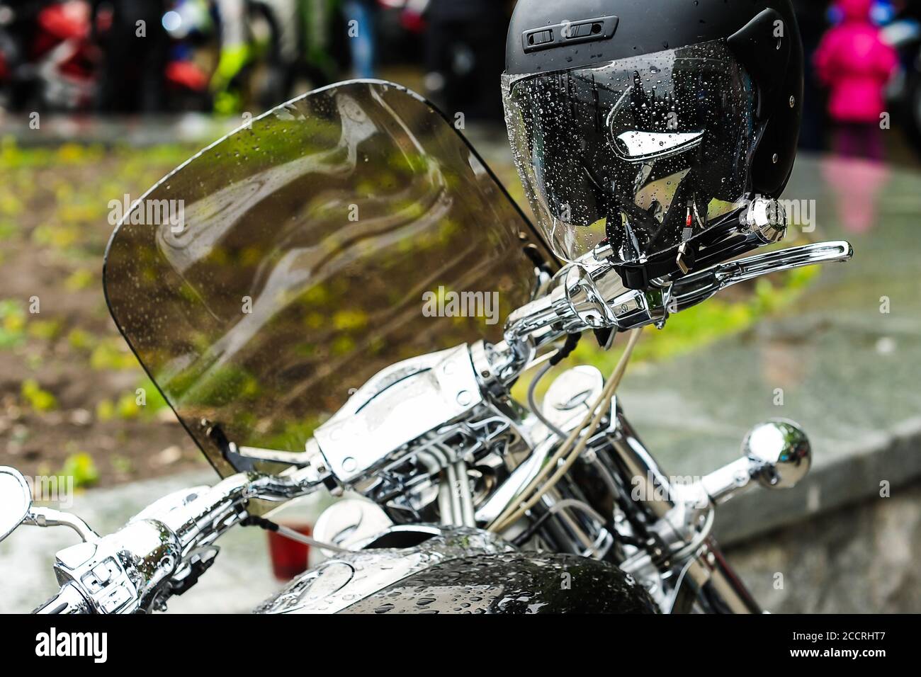 glossy black motorcycle with raindrops.chrome and gloss Stock Photo