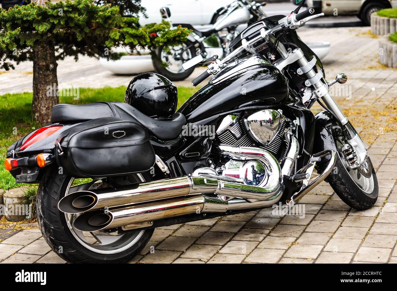 glossy black motorcycle with raindrops.chrome and gloss Stock Photo