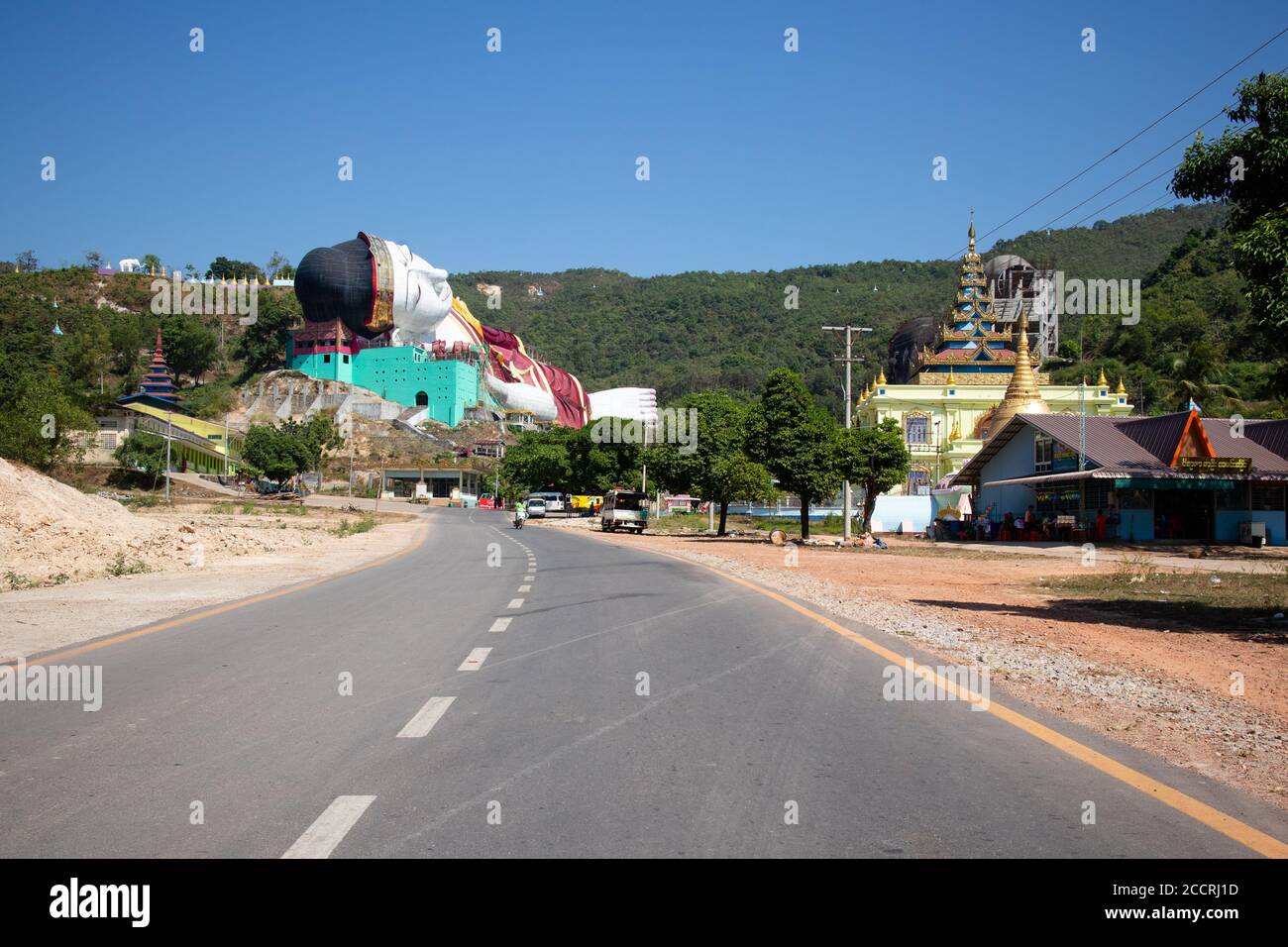 The largest statue in the world of a reclining Buddha. Picture from the road. Win Sein Tawya, Mawlamyine, Myanmar, Burma, South east Asia Stock Photo