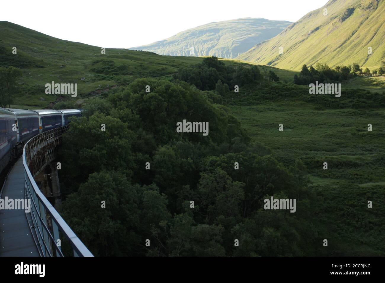 View of the mountains and valley from the overnight sleeper train, London to Fort William, the 'Deerstalker train' Stock Photo