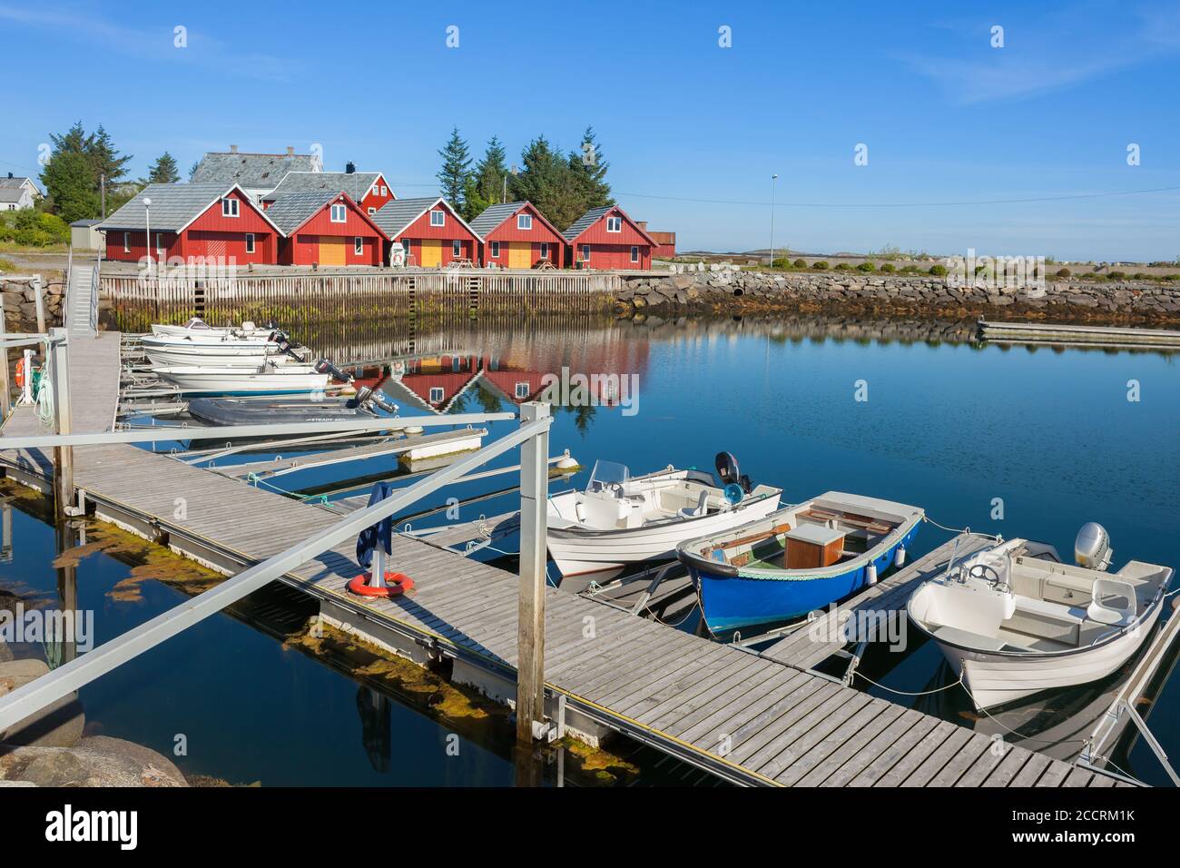 FINNOY, NORWAY - 2014 JUNE 02. Finnoy boat harbour with blue sky. Stock Photo