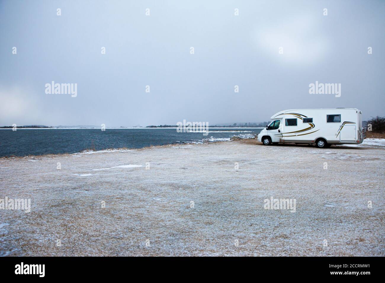 Motorhome parked at the coast in wintertime. Stock Photo